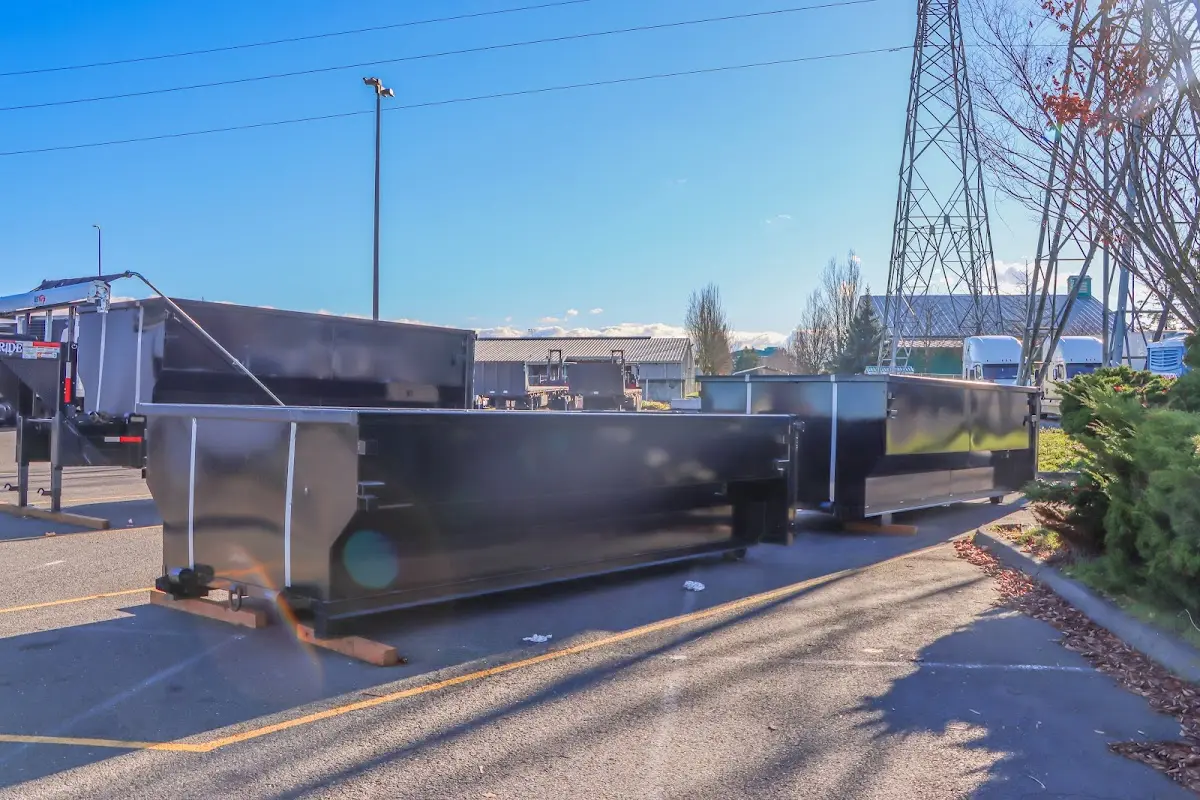 Roll-off dumpster ready for waste disposal at job site for 15 Yard Dumpster Rental in Macclenny